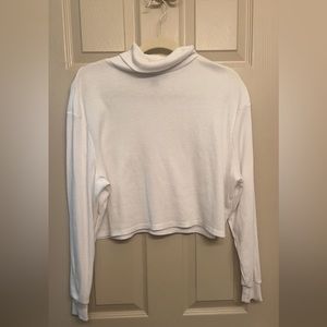 White, thin, turtleneck